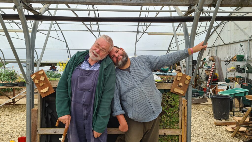 Friends enjoying gardening to reduce stress.