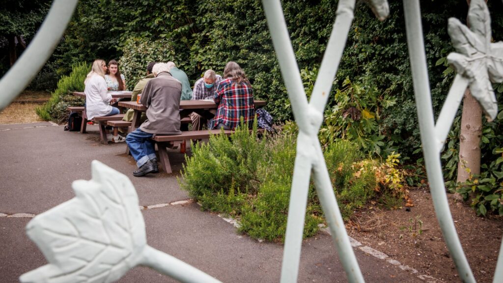 Photo of a Guideposts group talking at a picnic table