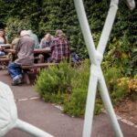 Photo of a Guideposts group talking at a picnic table