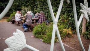 Photo of a Guideposts group talking at a picnic table