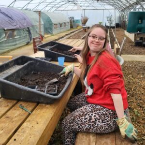 Smiles at Dig 'n' Grow Guideposts