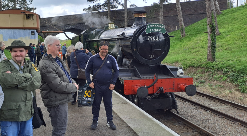 Guideposts Dig 'n' Grow next to the Asparagus Express steam train, with thanks to Never Seen, Never Been.